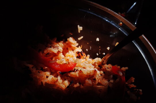 cooking red rice in the kitchen