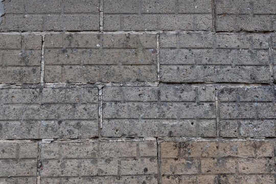 Gray Concrete Block Texture Background for Copy Space Rough Surface Weathered Industrial Pattern Durable and Utilitarian Aesthetic Non-Reflective Matte Finish Natural Light Detail