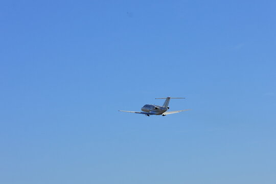 Business jet taking off from Juiz de Fora Airport in Brazil