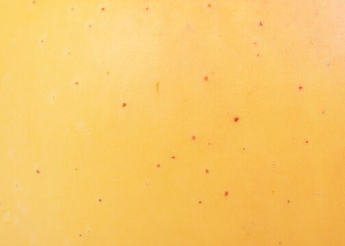 Macro photo of apple texture as background. Yellow apple background.