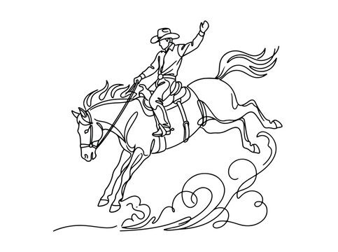 Cowboy riding bucking bronco at rodeo event