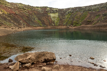 Kerid Crater is a volcanic crater lake located along Iceland's famous Golden Circle route in the Grimsnes area of South Iceland © Afonso Farias