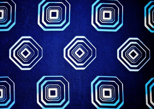 Seamless concentric geometric octagon pattern on dark blue textile fabric background