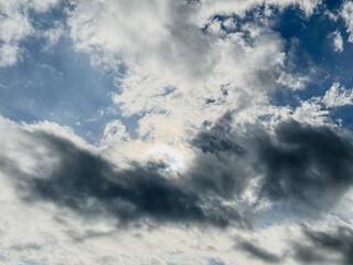 Obraz premium Sun Hidden by Dark Clouds with Dramatic Sky