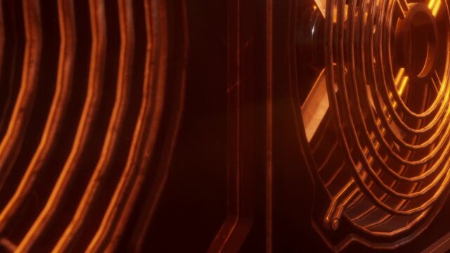 A close view of a series of circular shapes and lines. The design is set in a dark area, with bright orange light reflecting off the surfaces.