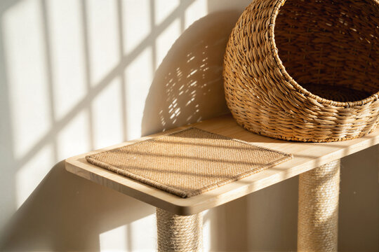 Low wooden cat tree with sisal post and wicker basket
