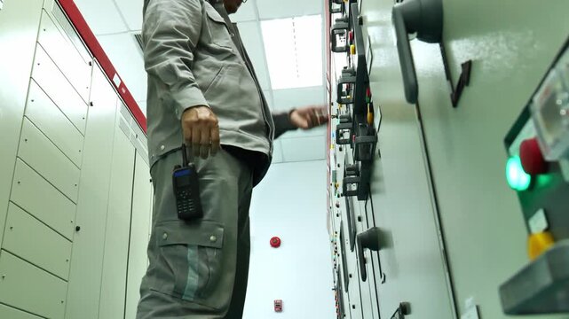 Electrical technician performing Lockout Tagout on a power distribution panel after verifying electrical conditions, demonstrating safe maintenance practices, energy isolation, hazard prevention, and 