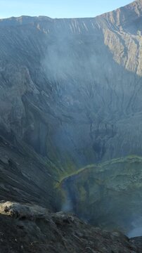 Smoking crater of mount bromo volcano in indonesia