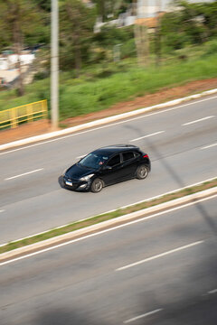 High-Angle Shot of Black Hyundai i30 Driving on Highway