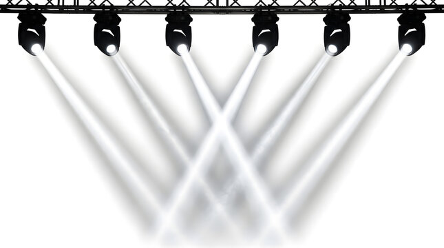 Multiple bright stage spotlights shining down on a white background.