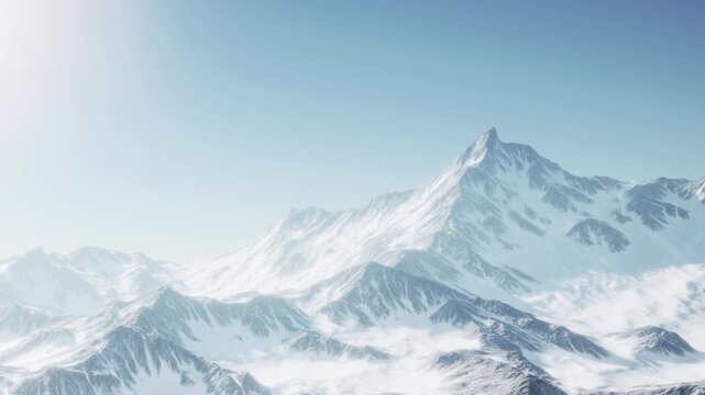 Mountains rise in the distance with snow covering their peaks. The bright blue sky shines above, showing a clear day. The landscape is vast and open, highlighting natures beauty.