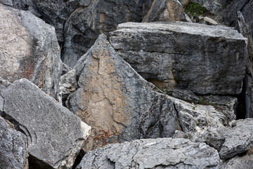 Pile of Travertine rock boulders, pointed and block shapes, pattern and texture nature background, Yellowstone National Park  © knelson20