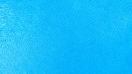 Obraz premium Top view of deep blue sea water surface with small ripples, aerial drone shot of turquoise ocean texture at island , abstract nature background 