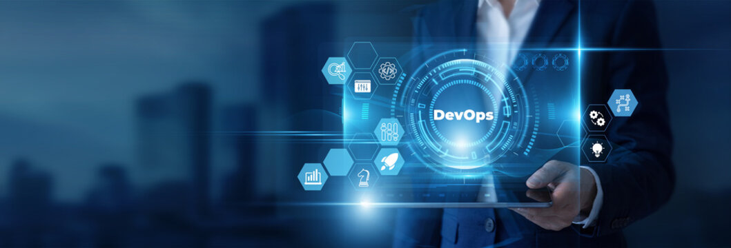 Businessman Hand Holding Digital Tablet to Analyze DevOps Data and Software Delivery, CI CD Pipeline, Continuous Integration, Infrastructure Automation, Agile Workflow, Cloud Deployment