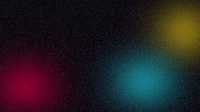Abstract looping motion graphic with colorful glowing orbs and grainy dark background