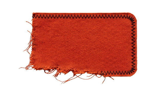Rectangular orange canvas fabric patch with black zigzag stitching isolated on transparent background