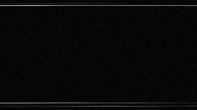 Noise, dirt, dust, scratches and grain on old damaged film surface. Old film look, tv signal with white bad interference, static noise background. Black background. 4K