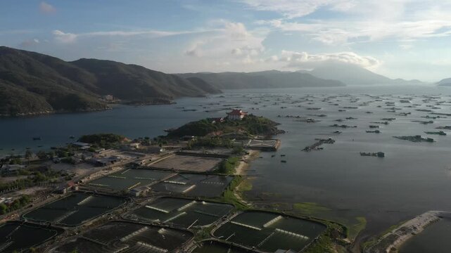 Aerial view of Van Phong Bay, Hon Ong Island and the route to Son Dung Beach in Dai Lanh Commune, Khanh Hoa, Vietnam, showcasing pristine islands, turquoise waters and coastal scenery.