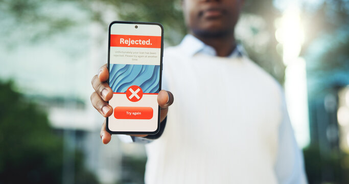 Businessman, hands or phone screen with loan rejection for poor credit, RPA or affordability issue. UI, finance portal and person with mobile outdoor for application fail, decline or try again option