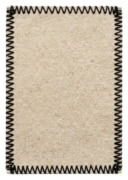 Close-up of a textured fabric swatch with a zigzag stitch border.