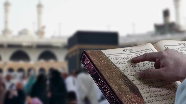 Muslim Man Reading the Holy Quran at the Grand Mosque in Mecca. Reading Quran in Front of Kaaba at Masjid al-Haram in Mecca. Quran Reading at Masjid al-Haram with Kaaba Background. Muslim praying