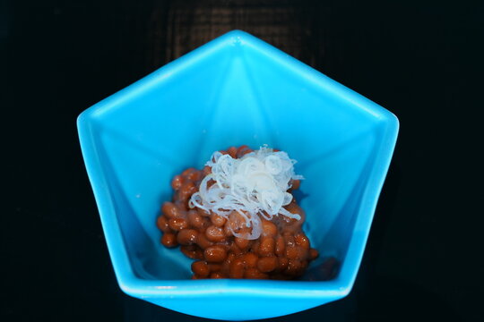 Natto Fermented Soybeans Topped with Green Onions, Traditional Japanese Breakfast Food