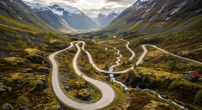 Winding road through valley landscape