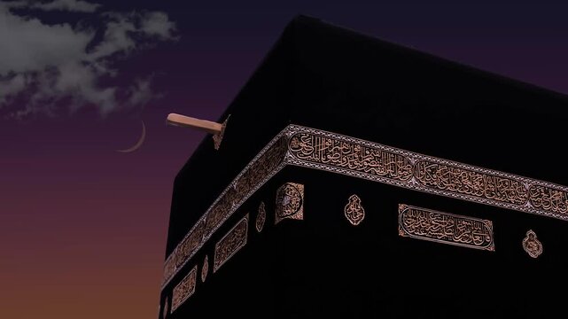 Close up view of the Kaaba at Masjid al Haram in Mecca, Saudi Arabia, featuring its black Kiswah with intricate golden Arabic calligraphy and the Makkah Royal Clock Tower in the background 