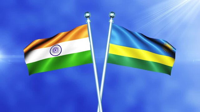 India and Rwanda Flag Relations Concept with Crossed National Flags Waving on Pole Loop Against a Bright Cloudy Sky