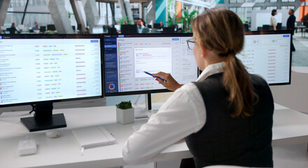 Young Woman Working Quickly On Help Desk Tickets