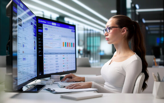 Young Marketing Expert Using Computer To Analyze Customer Data