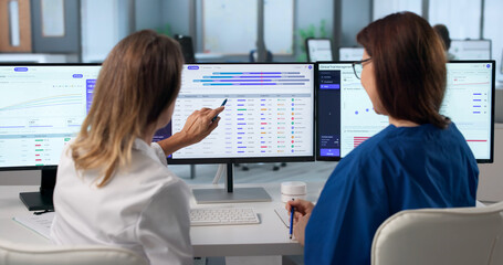 Woman In Medical Uniform Analyzes Patient Enrollment Data