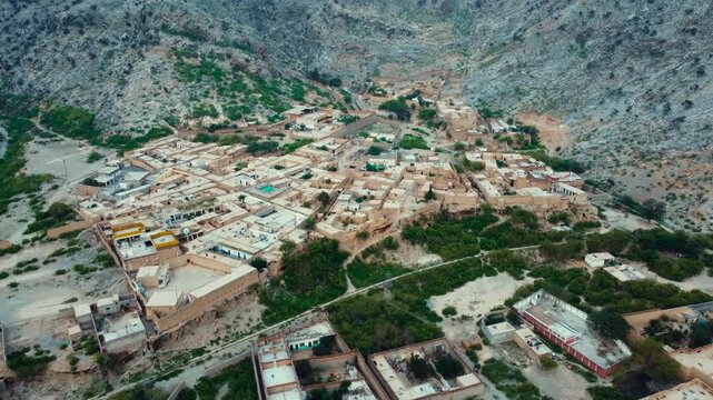 Aerial view of Landi Kotal village surrounded by rugged mountains in Khyber, Pakistan
Aerial landscape of Landi Kotal surrounded by rugged mountains traditional homes
Landi Kotal mountain landscapes