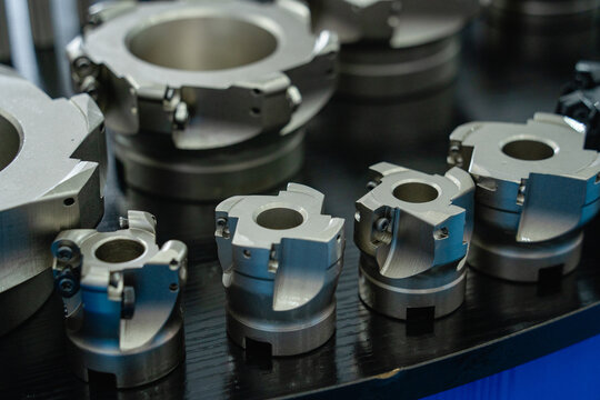 Set of varying sized metal milling cutters for industrial machining