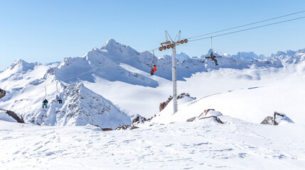 Naklejka premium Ski lift in Ski Resort high in the mountains