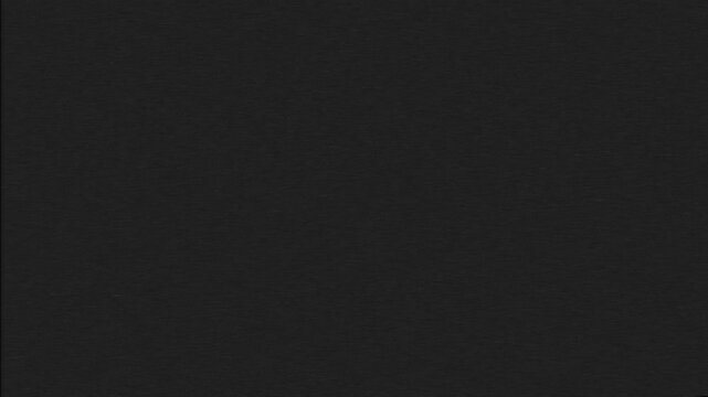Dark film texture vintage grainy cinematic background overlay noise for adding authentic old movie effects and artistic grit to video projects.