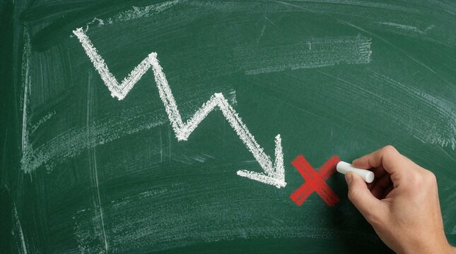Hand draws downward zig zag arrow graph on green board ending with red cross mark. Represents business loss financial decline. Indicates negative trend failures.