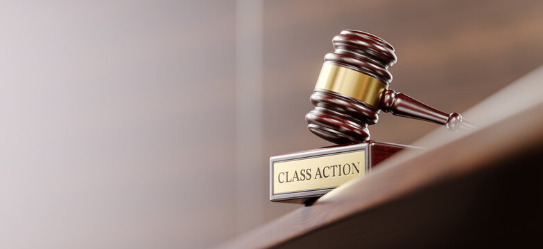 Class Action: Judge's Gavel as a symbol of legal system and wooden stand with text word