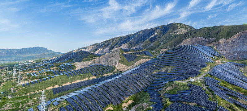 Solar Power Plant on Mountain Slopes in Early Morning