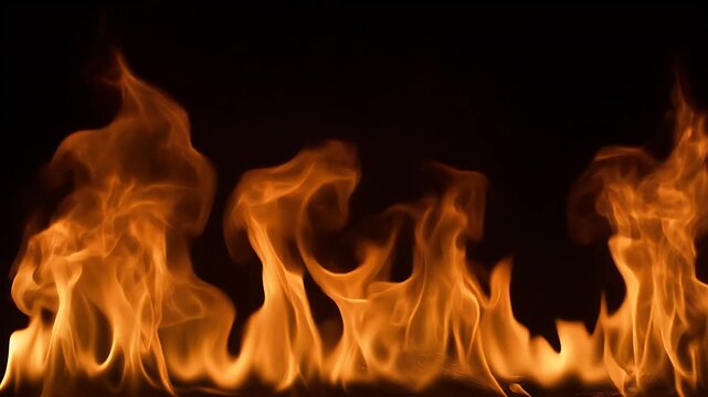Close-up view of vibrant orange flames dancing against a dark background.