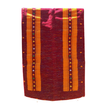 Traditional Indonesian woven fabric kain tenun from Flores Island, East Nusa Tenggara, Indonesia, isolated on white background.