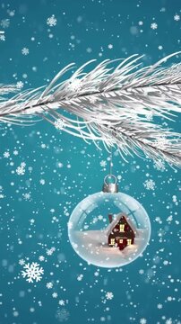 Animation of snow falling over christmas snow globes in winter scenery
