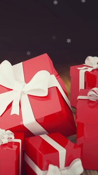Animation of snow falling over presents on wooden background