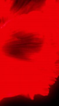 Animation of red rotating wave on black background
