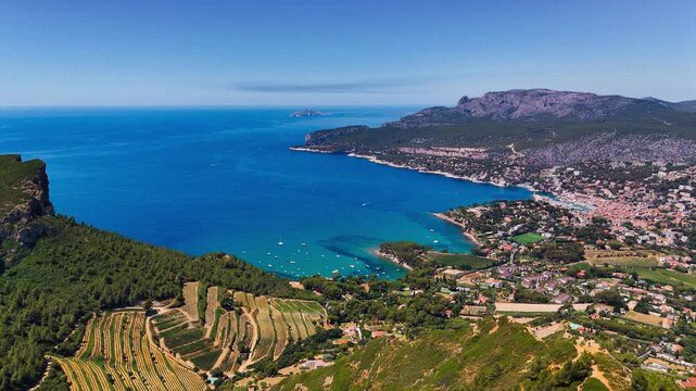 Aerial drone view of bay with turquoise sea and the town of Cassis, Provence, Alps, Cote dAzur, Marseille district, France. High quality 4k footage