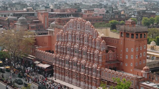 Aerial view of Hawa mahal palace in jaipur showing stunning rajasthani architecture and bustling street traffic below