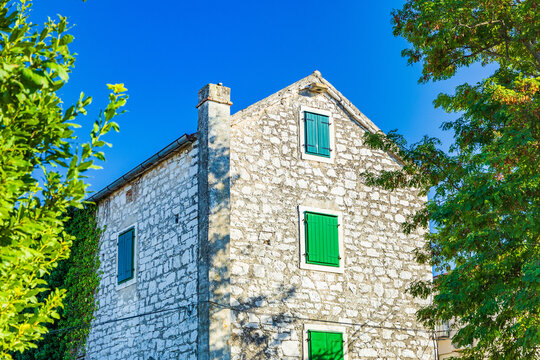 Traditional Stone House with Green Shutters in Biograd na Moru, Dalmatia, Croatia