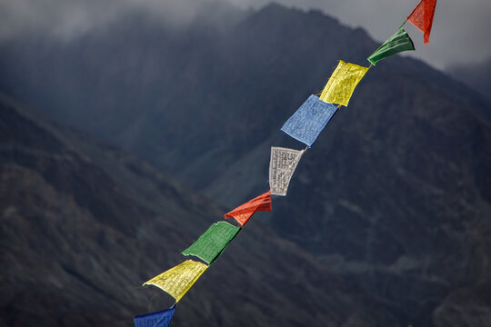 Detailed view of Buddhist prayer flags with mantras in Ladakh region India