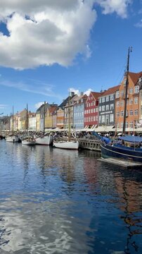 Colorful Nyhavn Canal Houses and Boats in Copenhagen Vertical
