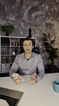POV of young businessman providing financial video consultation on his phone